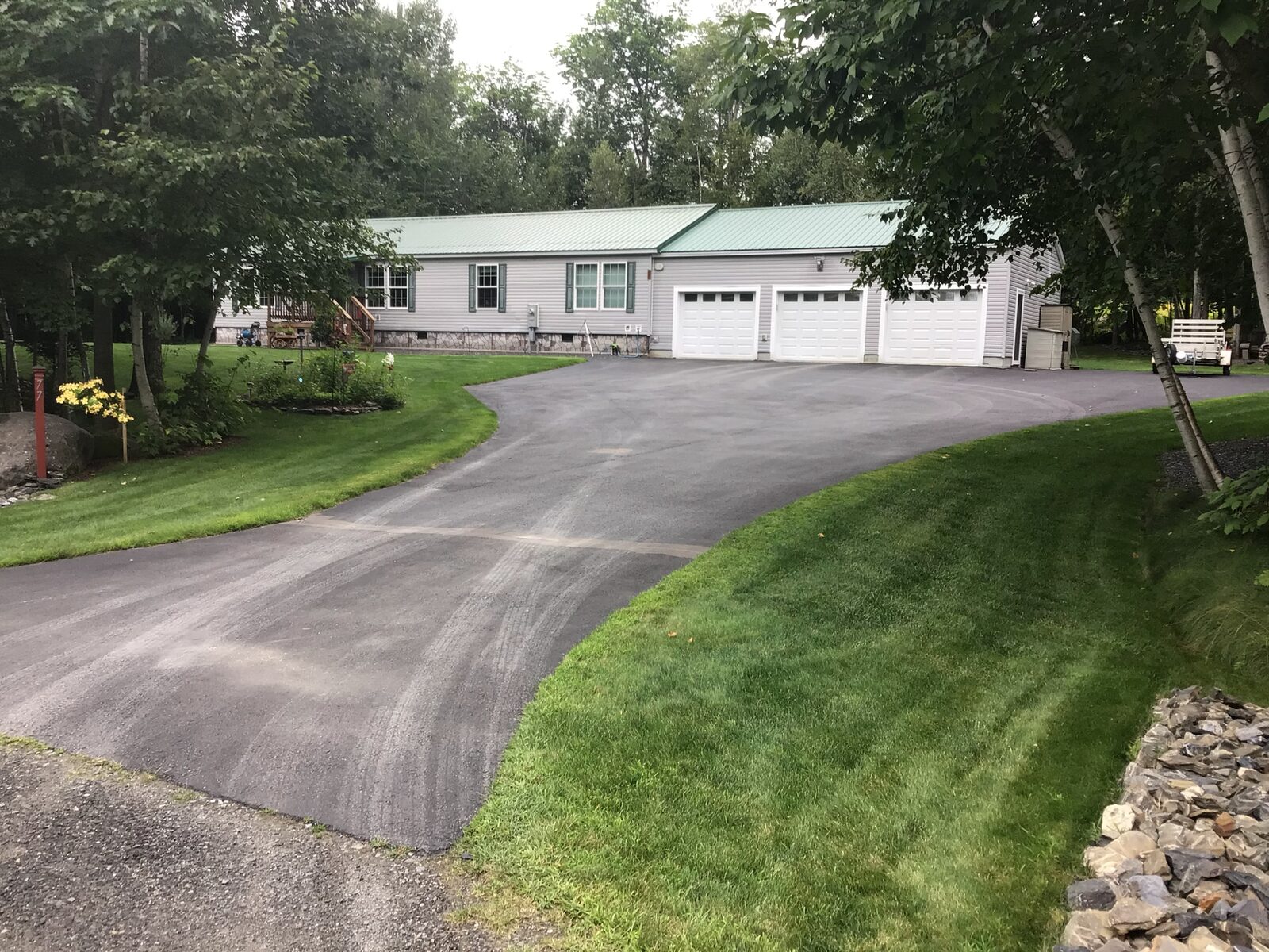 Driveway view of a treated property in the Bangor area
