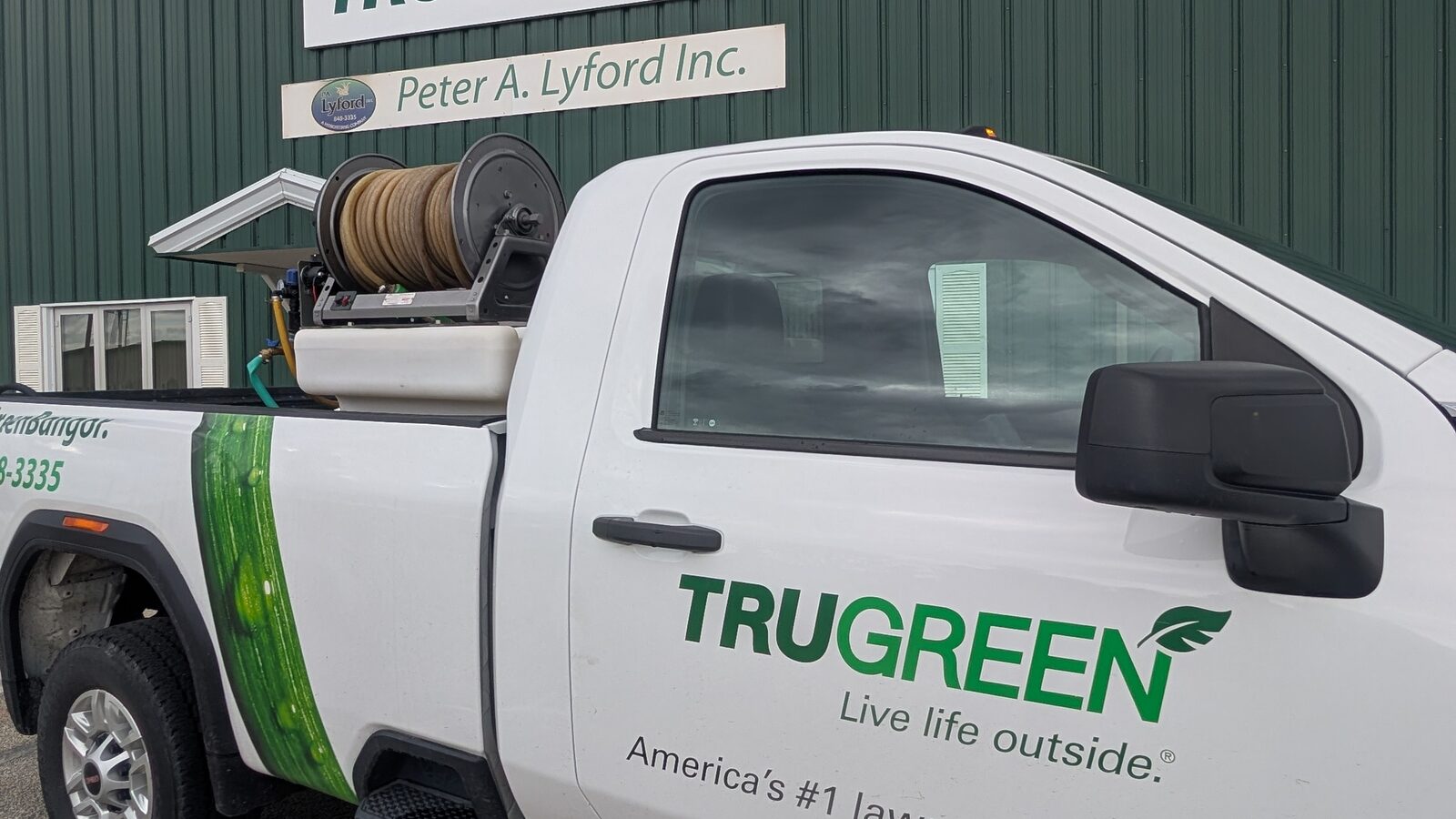 A TruGreen Bangor service truck — reliable partnership for local landscapers